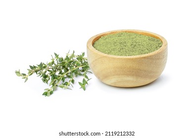 Fresh thyme leaves and dried thyme leaf powder in wooden bowl isolated on white background. - Powered by Shutterstock