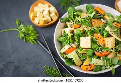 Fresh Tofu Salad With Sesame Seeds, Corn Salad, Apricote And Bamboo In The Bowl
