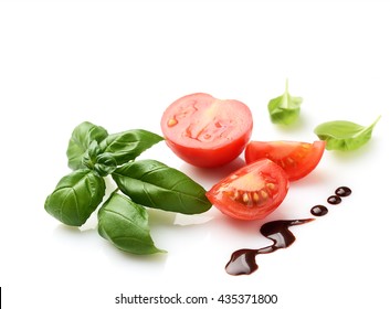 Fresh Tomato And Basil Leaf Isolated On White Background