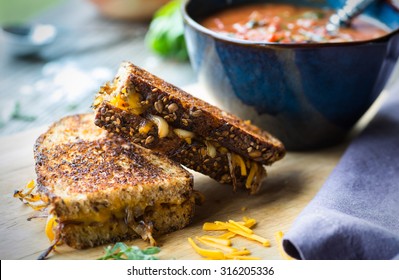 Fresh Tomato Soup With Grilled Onion And Cheese Sandwich