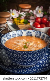 Fresh Tomato Soup With Rice In A Blue Bowl.