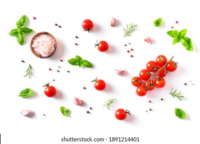 Fresh tomatoes, basil, sea salt and spices isolated on white background. Healthy food and vegan raw eating concept, creative flat lay. - Shutterstock ID 1891214401
