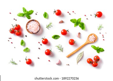 Fresh tomatoes, basil, sea salt and spices isolated on white background. Healthy food and vegan raw eating concept, creative flat lay. - Shutterstock ID 1892270236