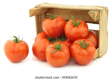 Fresh Tomatoes In A Wooden Crate On A White Background