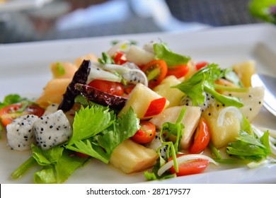 Fresh Tropical Fruit Salad In White Plate . Thailand Style