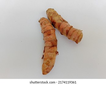 Fresh Tumeric Isolated Over White Background. 