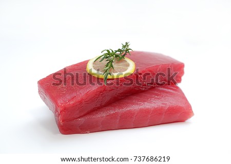 Fresh Tuna Fish Steak on a white background 