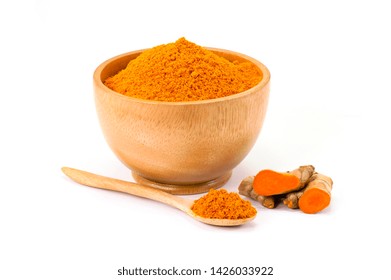 Fresh Turmeric Root ( Known As Curcumin, Curcuma Longa Linn) And Tumeric Powder In Wooden Bowl  Isolated On White Background. Indian Oriental Low Cholesterol Spices. Medicine Herbal Plant Concept. 