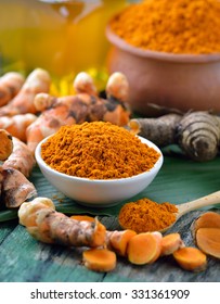 Fresh Turmeric Roots On Wooden Table Stock Photo 331361909 | Shutterstock