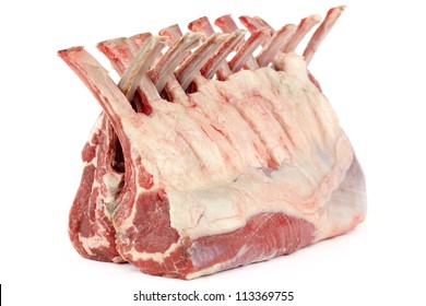 Fresh Two Racks Of Lamb With The Ribs Folded Together Isolated On A White Background