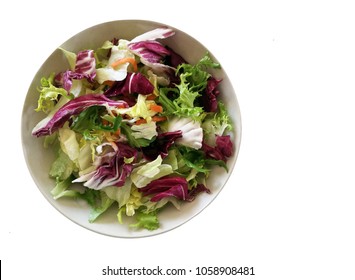 Fresh vegetable salad isolated on white background - Shutterstock ID 1058908481