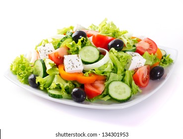 fresh vegetable salad isolated on white background - Shutterstock ID 134301953
