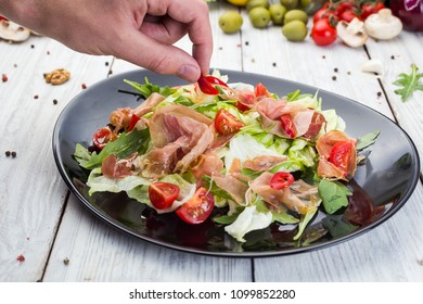 Fresh vegetable salad with prosciutto - Shutterstock ID 1099852280