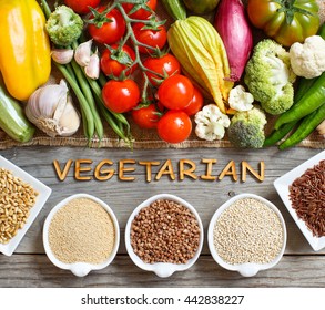  Fresh vegetables and cereals with word Vegetarian top view