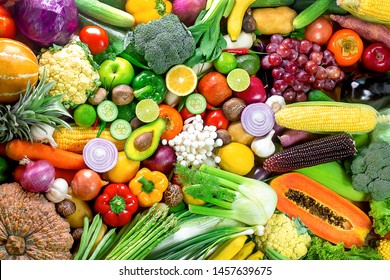 Fresh vegetables and fruits,Colorful fruits and vegetables,clean eating,vegetables and fruits background,top view,Set of fruits and vegetables,Food concept. - Shutterstock ID 1457639675