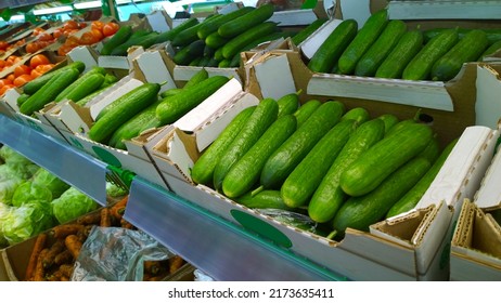 Fresh Vegetables, Green Cucumbers On Supermarket Shelves. Retail Industry. Local Farmers Market. Discount. Rich Harvest. Grocery Store. Healthy Products. Food Suppliers. Greenhouse. Inflation Concept.