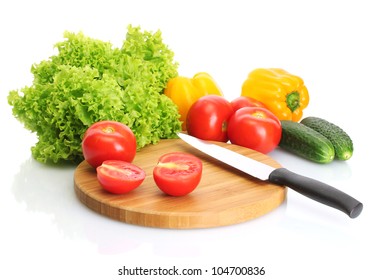 Fresh Vegetables And Knife On Cutting Board Isolated On White