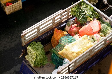 Fresh Vegetables On Blue Pickup Truck