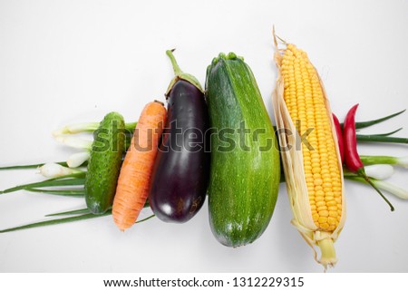 Similar – Beetroot, zucchini and corn on blue background