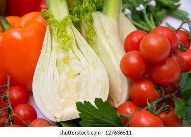 fresh vegetables with peppers, tomatoes and parsley