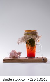 Fresh Vitamin Red Ginger Tea Cup With Strawberry, Mint, Pink Sugar Isolated