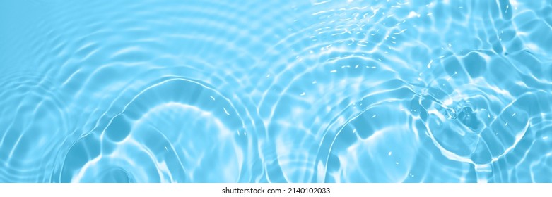 Fresh water background. Bright blue pattern with rippled water texture and splashes. Top view web banner. Clear water surface background. - Shutterstock ID 2140102033