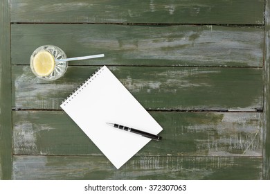 Fresh water with note on rustic table