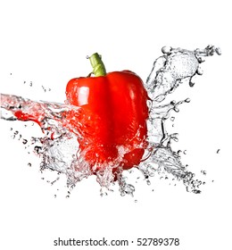 fresh water splash on red sweet pepper isolated on white