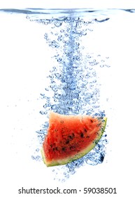 Fresh watermelon dropped into water