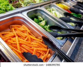 Fresh Wavy Crinkle Cut Carrots In A Salad Bar