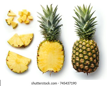 Fresh whole and cut pineapple isolated on white background. From top view