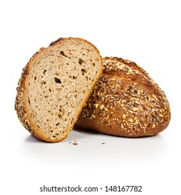 Fresh whole grain bread cut in half on white background - Shutterstock ID 148167782