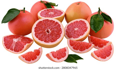 Fresh whole and sliced ruby red grapefruits with green leaves