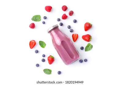 Fresh wild berry juice in glass bottle