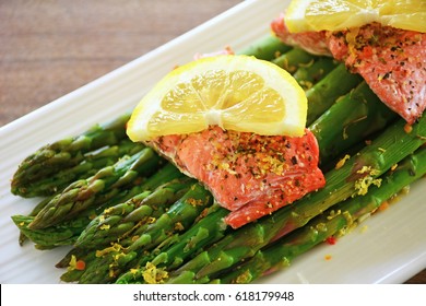 Fresh Wild Sockeye Salmon And Organic Asparagus Spears Cooked In Silicone Steamer. Horizontal Format With Selective Focus.