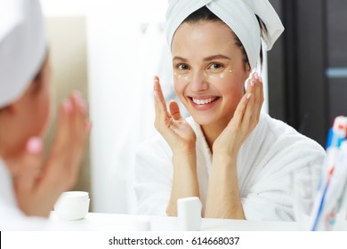 Fresh Woman Taking Care Of Her Eye Zone