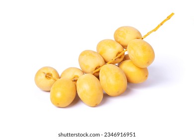 Fresh yellow date palm fruit isolated on white background with clipping path. - Shutterstock ID 2346916951