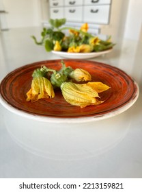 Fresh Yellow Flowers Of A Small Decorative Pumpkin. Fried Pumpkin Flower As Summer Appetizers.