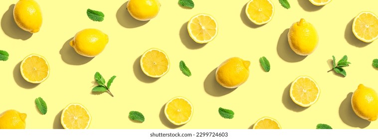 Fresh yellow lemons with mints overhead view - flat lay - Powered by Shutterstock