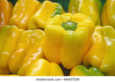 Fresh yellow peppers in the market