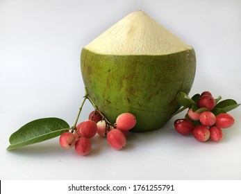 Fresh Young Coconut And Karonda Fruit On White Background