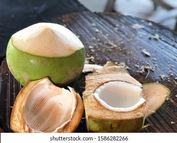 Fresh young coconut, ready to drink.