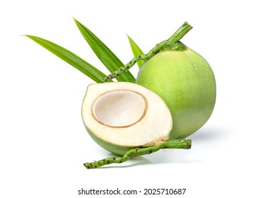 Fresh young green coconut fruit and cut in half slice with green leaf isolated on white background. 