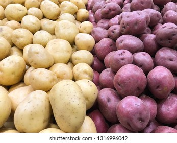 Fresh Yukon Gold Potatoes And Red Potatoes Side By Side. Both Are Sources Of Carbohydrates.