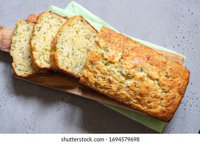 Fresh zucchini bread on a wooden board