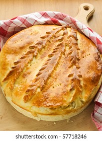 Fresh-baked traditional ukrainian homemade cabbage pie. Shallow dof.