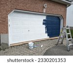 Freshening up the garage with new navy blue paint