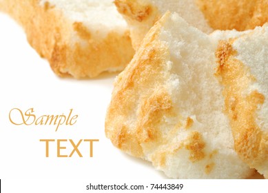 Freshly Baked Angel Food Cake On White Background With Copy Space.  Macro With Shallow Dof.