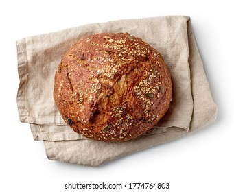 Freshly Baked Artisan Bread On Linen Napkin Isolated On White Background, Top View