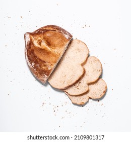 Freshly Baked Artisan Mexican Bread Cut Into Slices, Top View On White Background, No People